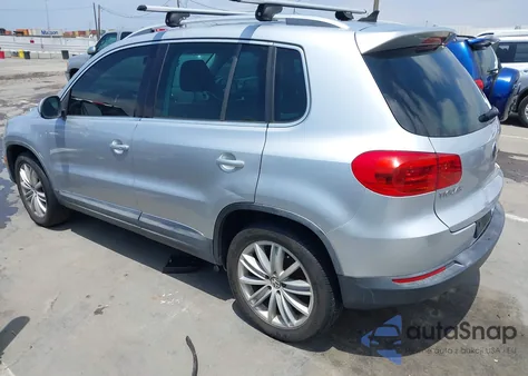 2014 Volkswagen Tiguan Sel z USA, uszkodzony, nr VIN WVGAV3AX2EW557480